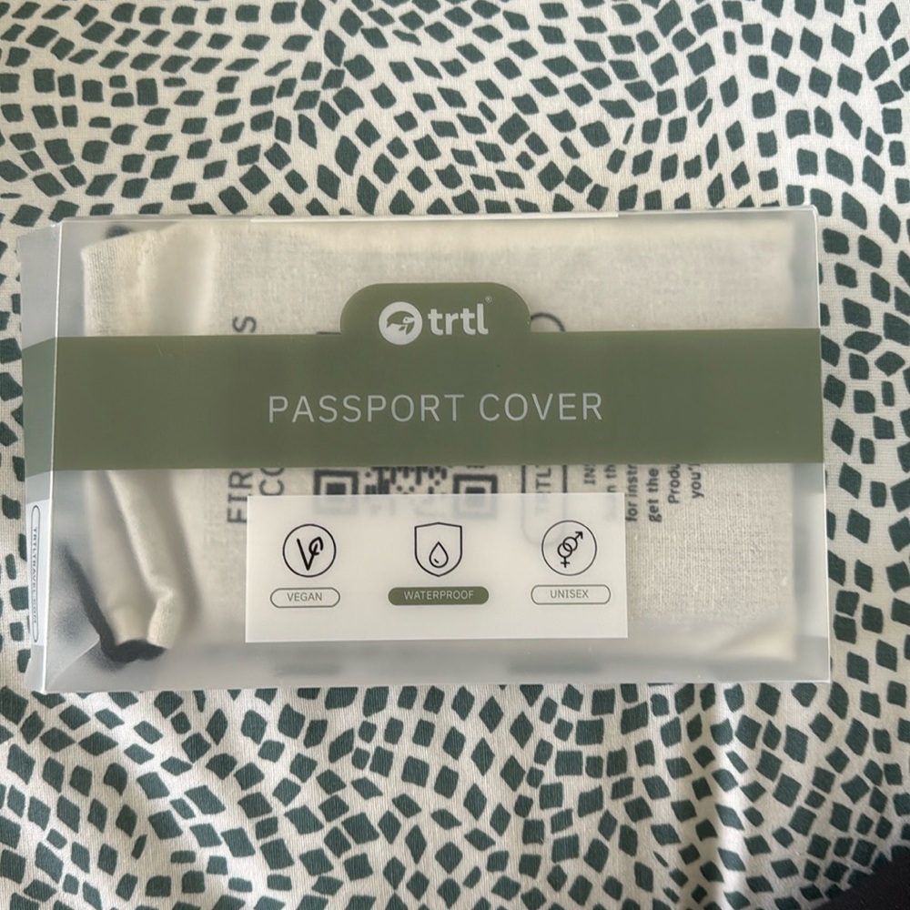 Brand new in the box trtl brand passport cover in gray